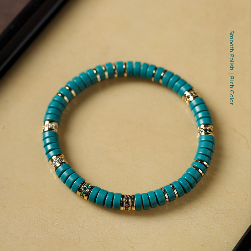 Teal-green tablet bracelet showing polished finish and rich color