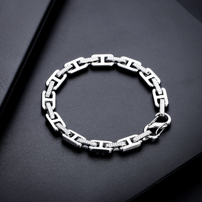 Textured silver-tone H-link bracelet displayed on a black background