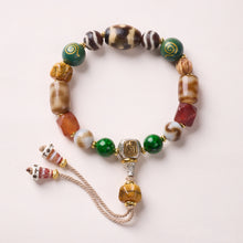Tibetan Treasures – Dzi & Deity Connector
