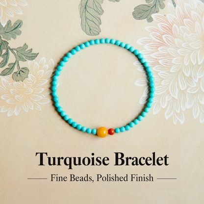 Turquoise bead bracelet with adjacent amber and red agate beads