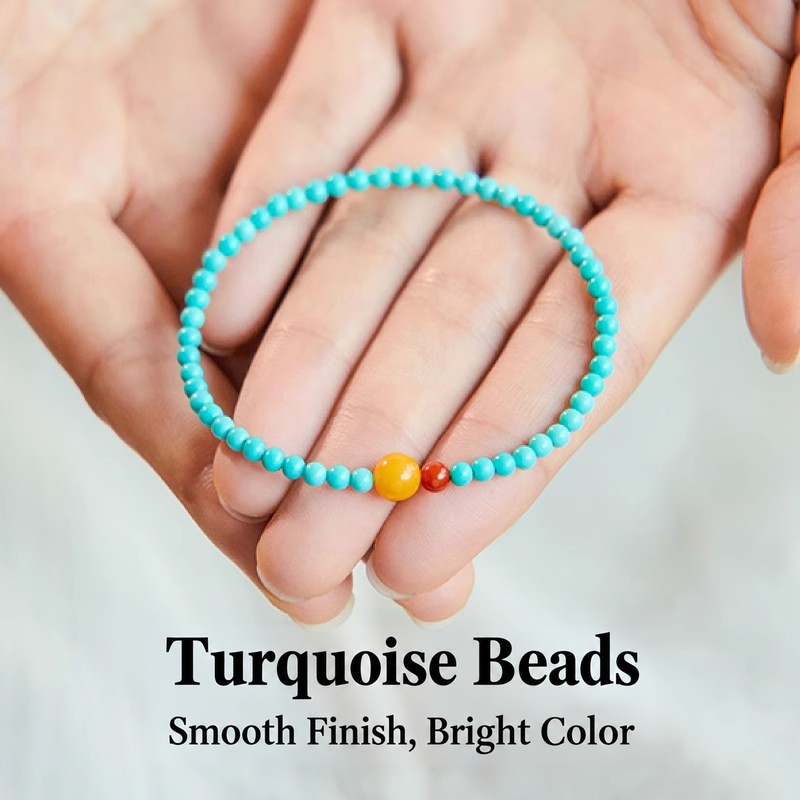 Fine turquoise bracelet shown in hand with yellow and red accents