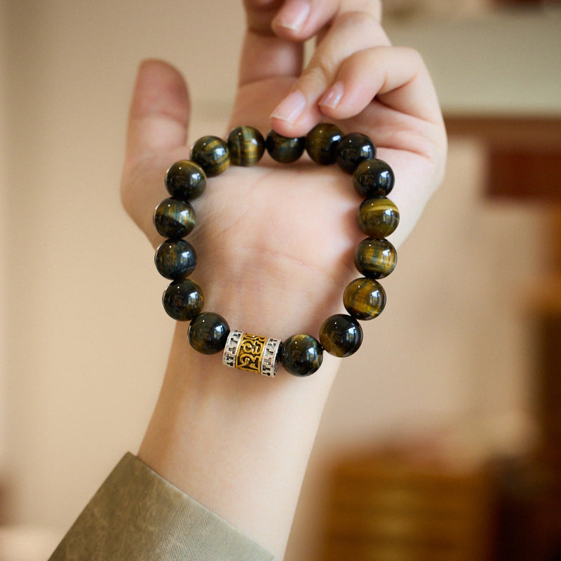12mm tiger eye bracelet shown against a wrist for scale