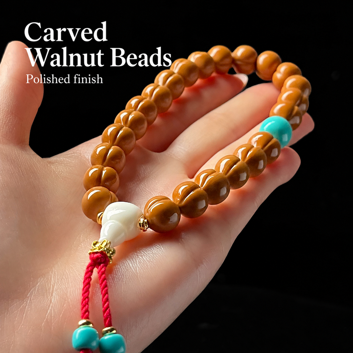 Walnut hand strand with white charm and blue accents