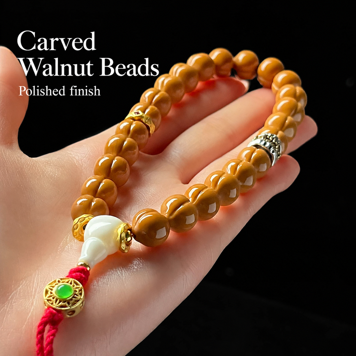 Walnut hand strand with decorated white charm