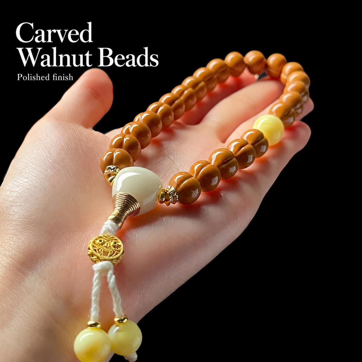 Walnut hand strand with cream charm and yellow accents