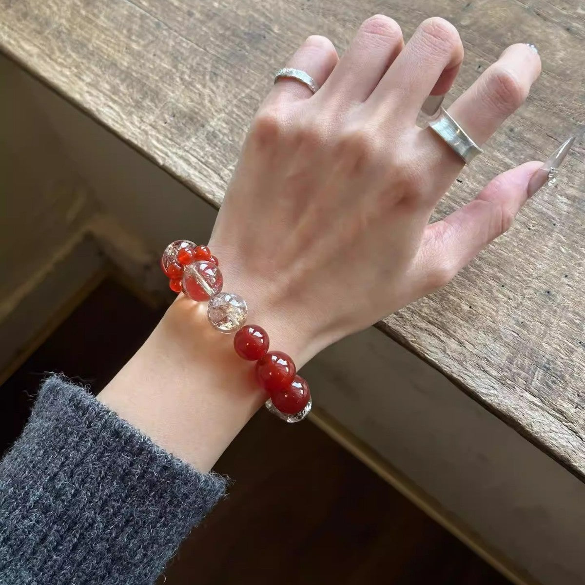Red agate and golden-inclusion crystal bracelet – actual product photo 4