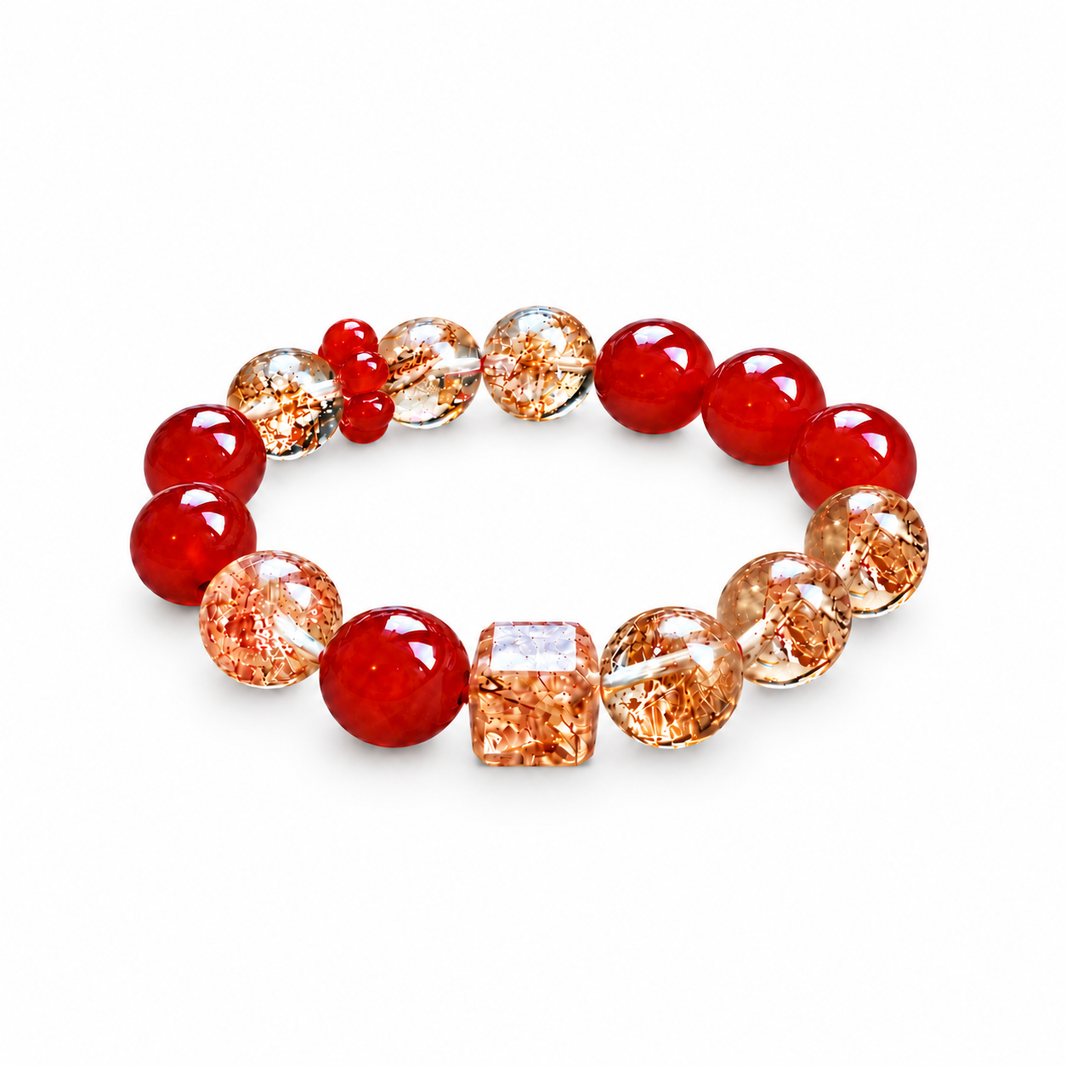 Red agate and golden-inclusion crystal bracelet with a centered faceted cube on white