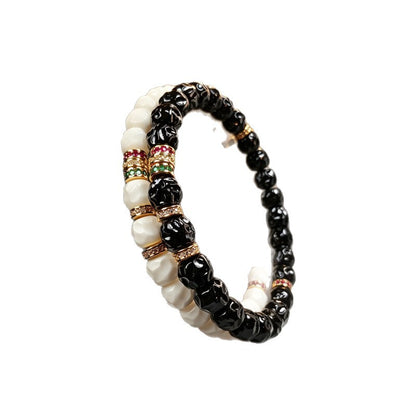 Black and white decorative bracelet designs displayed together