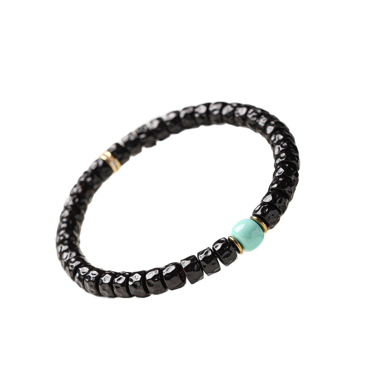 Complete coconut-pedicel bracelet design with pale blue center bead