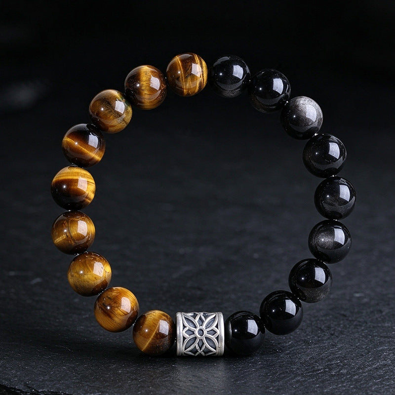 Golden tiger eye and black obsidian bracelet displayed upright