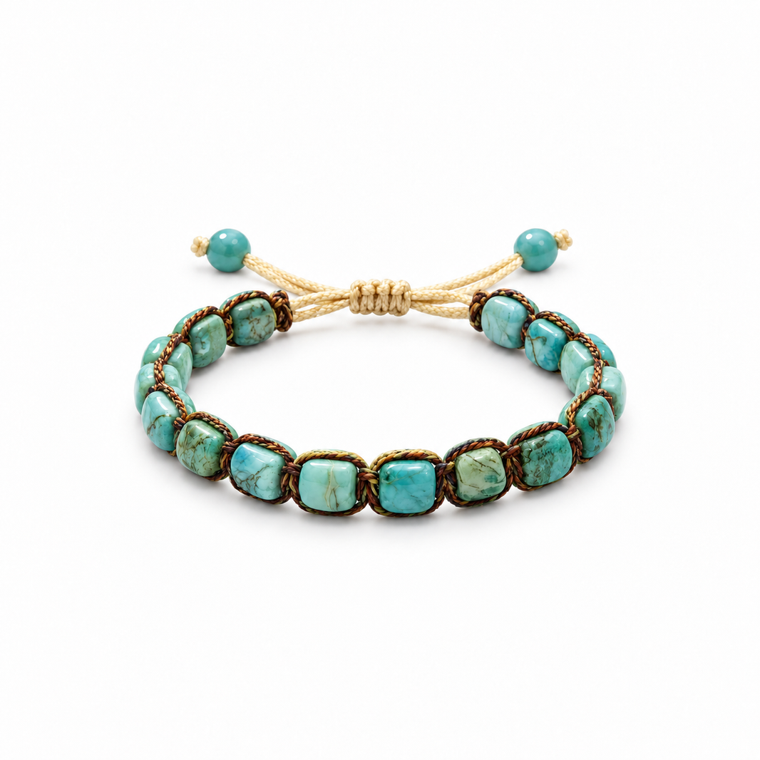 Aqua blue patterned stone bracelet with woven cord and adjustable sliding knot on white