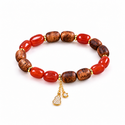 Nanhong red agate and agarwood bracelet with star and gourd charms on white