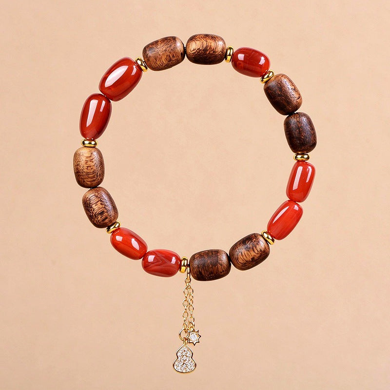 Complete Nanhong red agate and agarwood bracelet with dangling charms
