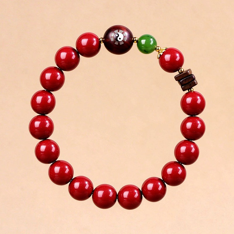 Complete red cinnabar bracelet with engraved bloodwood accent