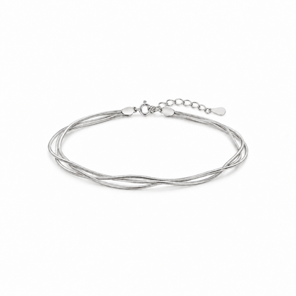 Triple-strand sterling silver snake chain bracelet on white background