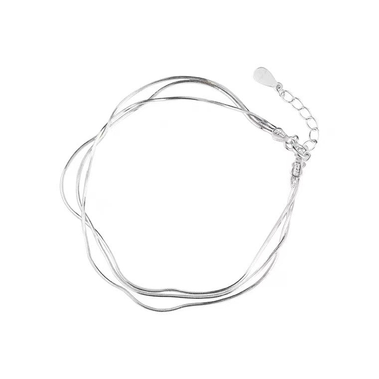Original three-strand silver bracelet with extension chain