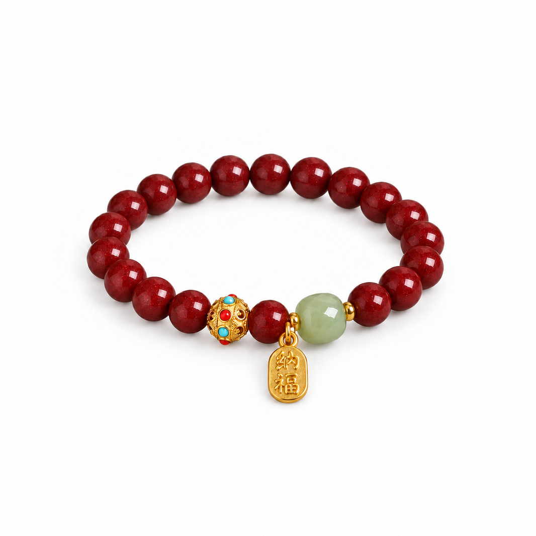 Deep red cinnabar bracelet with pale green accent and good fortune charm on white