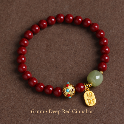 Deep Red cinnabar bracelet with 6 mm red beads and gold-tone charm