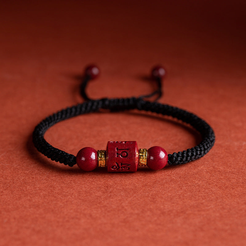 Adjustable black cord cinnabar mantra bracelet