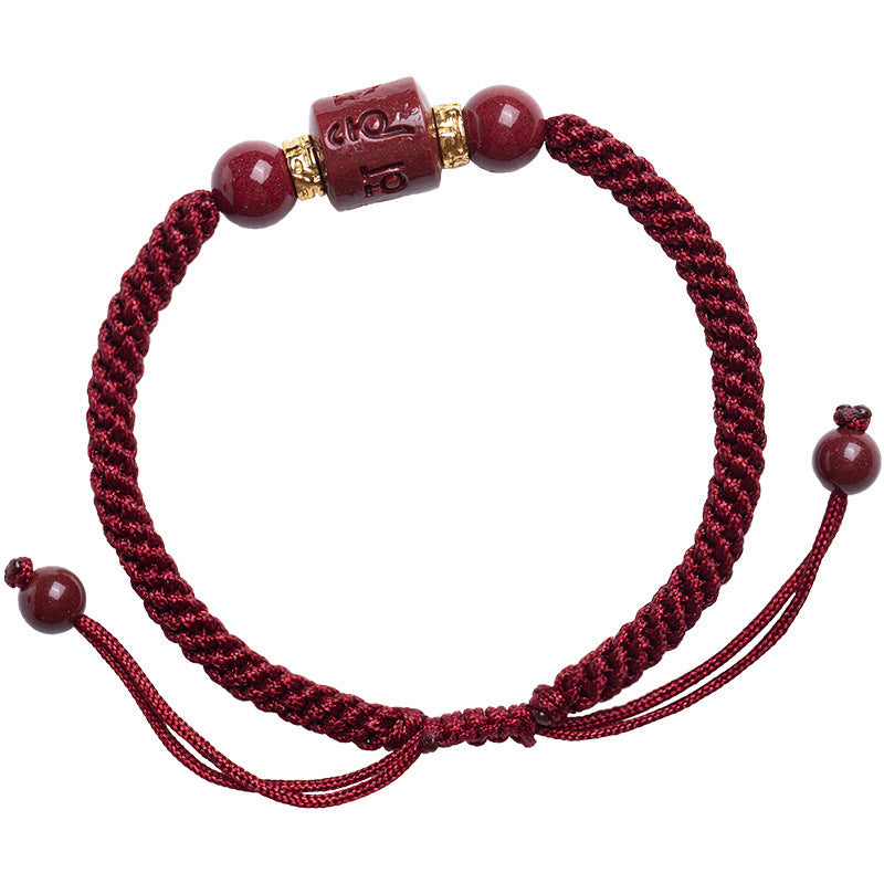 Burgundy cord bracelet showing sliding knot and bead-tipped ends