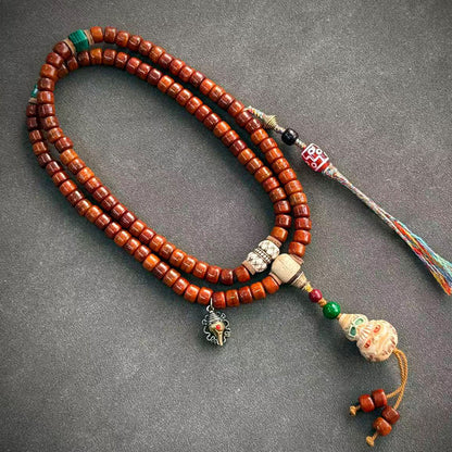 Tibetan-style yak bone mala, 04 - Carved Face & Multicolor Tassel