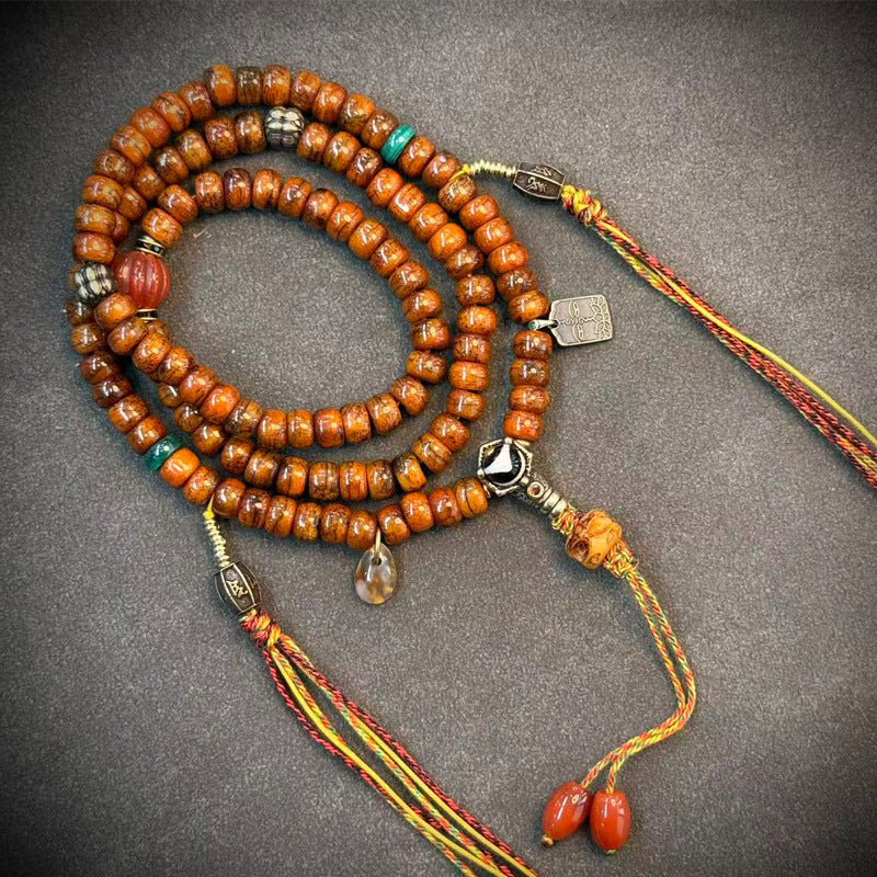 Tibetan-style yak bone mala, 10 - Orange Accent & Multicolor Cords