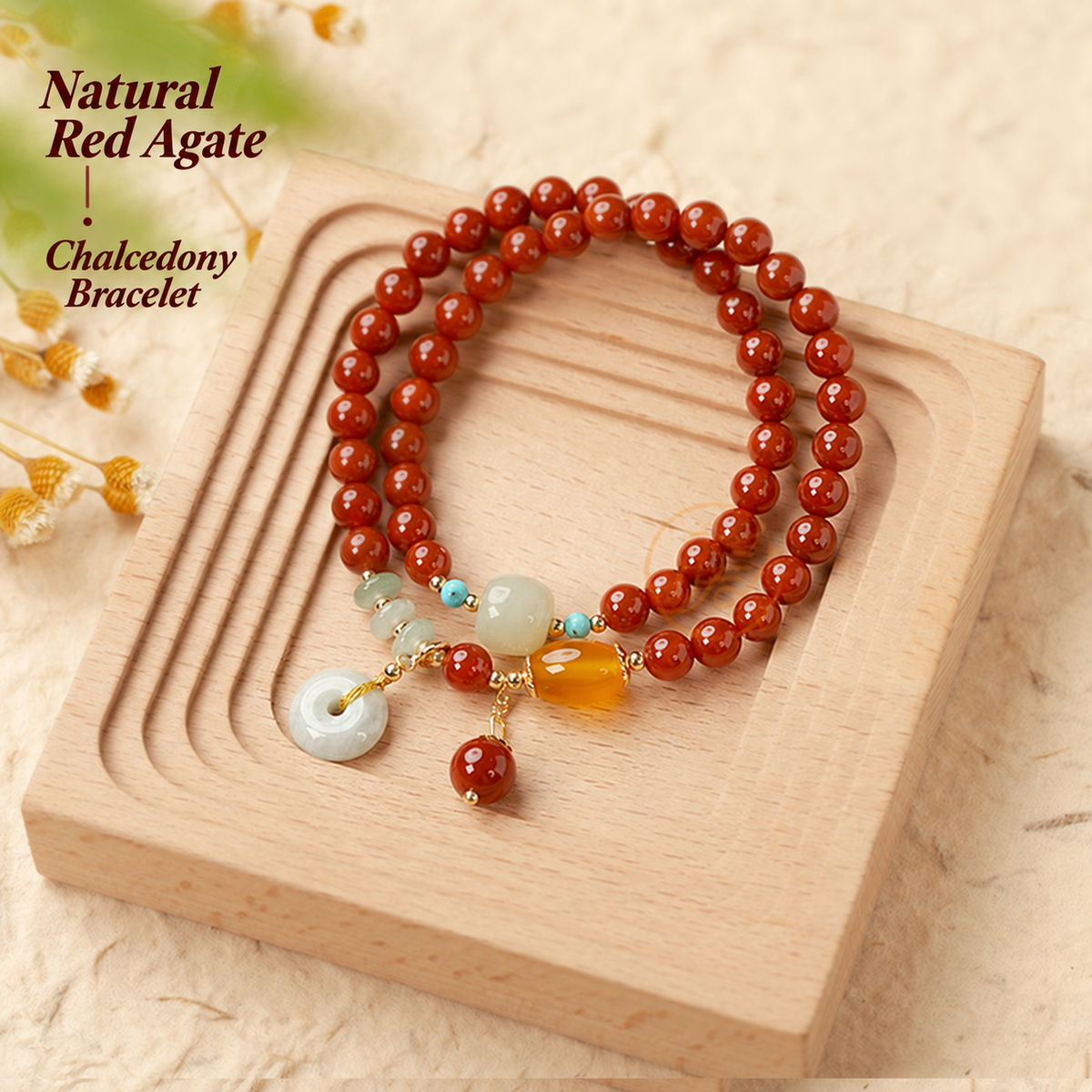 Natural red agate chalcedony bracelet displayed on a wooden tray