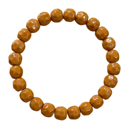 Cheese-cut walnut bead bracelet, source white-background view