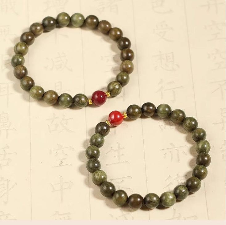Deep red and bright red cinnabar accent green sandalwood bracelet designs