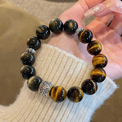 Tiger eye and sheen obsidian bracelet wrist detail