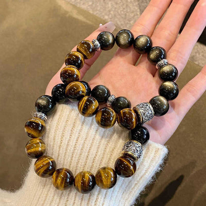 Two matching tiger eye and sheen obsidian bracelets shown for styling; one per selected item