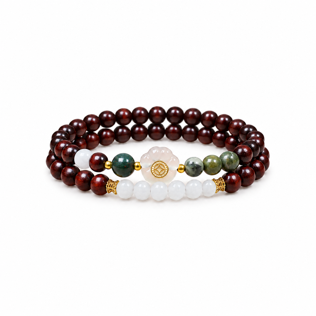 Dark wood double-wrap bracelet with white agate cat paw and green and white stone accents on white
