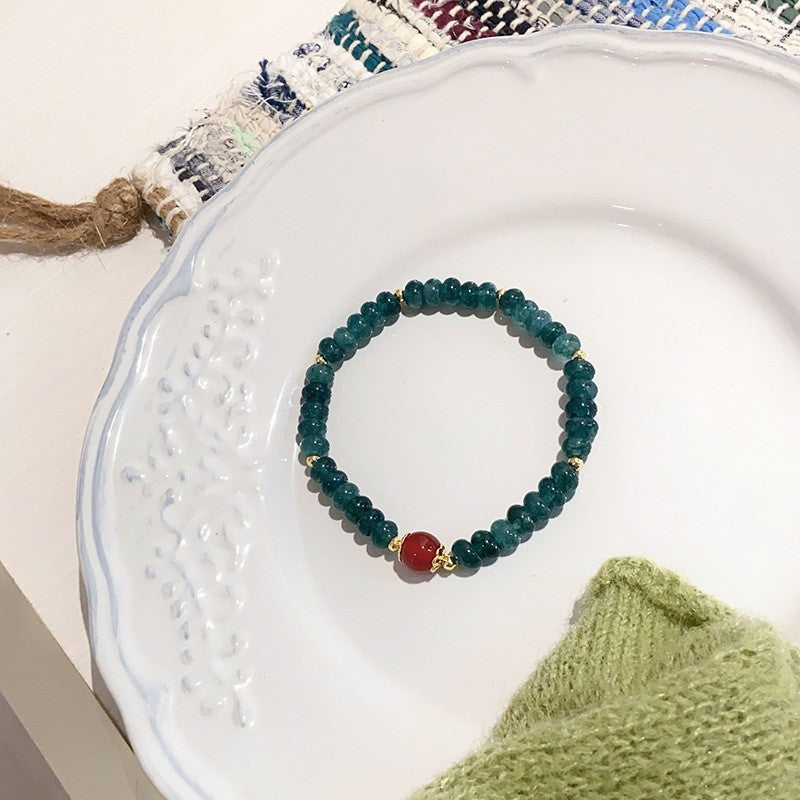Red Agate Accent · 6 × 2 mm Rondelles bracelet