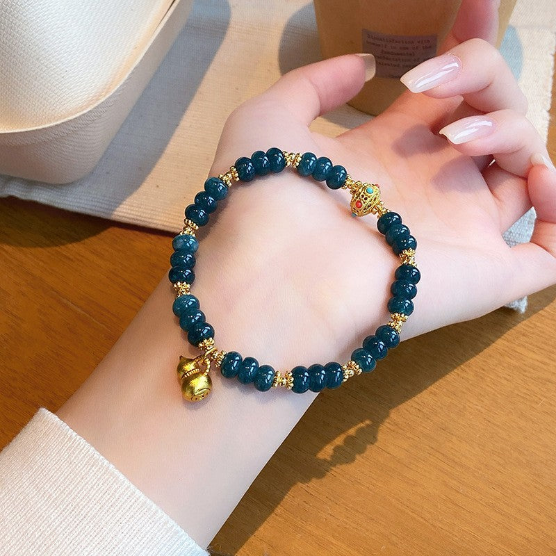 Gourd Charm · 6 × 2 mm Rondelles bracelet