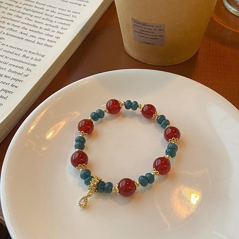 Red Agate Mix · 10 mm bracelet
