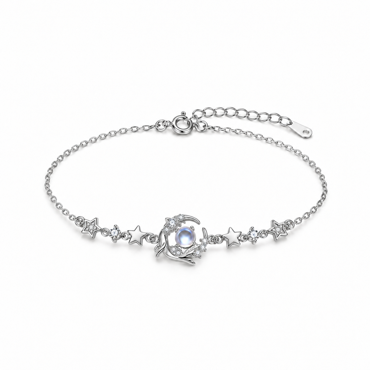 Sterling silver whale and star bracelet with blue glass center on white background
