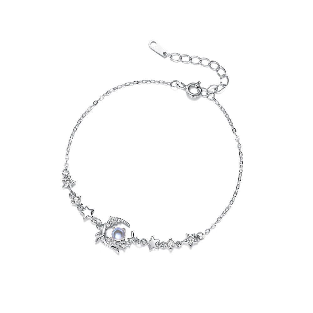 Original overhead view of whale and star bracelet