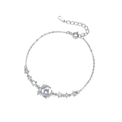 Original overhead view of whale and star bracelet