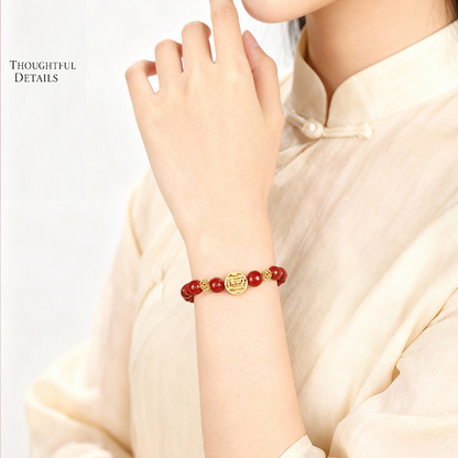 Red cinnabar bracelet worn on wrist
