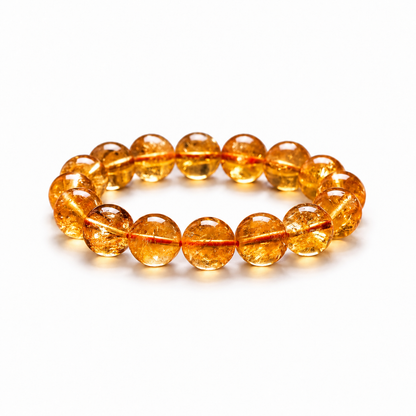 Golden yellow quartz bracelet with sparkling internal textures on white