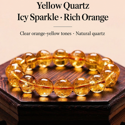 Yellow quartz bead bracelet on a wooden display with English text
