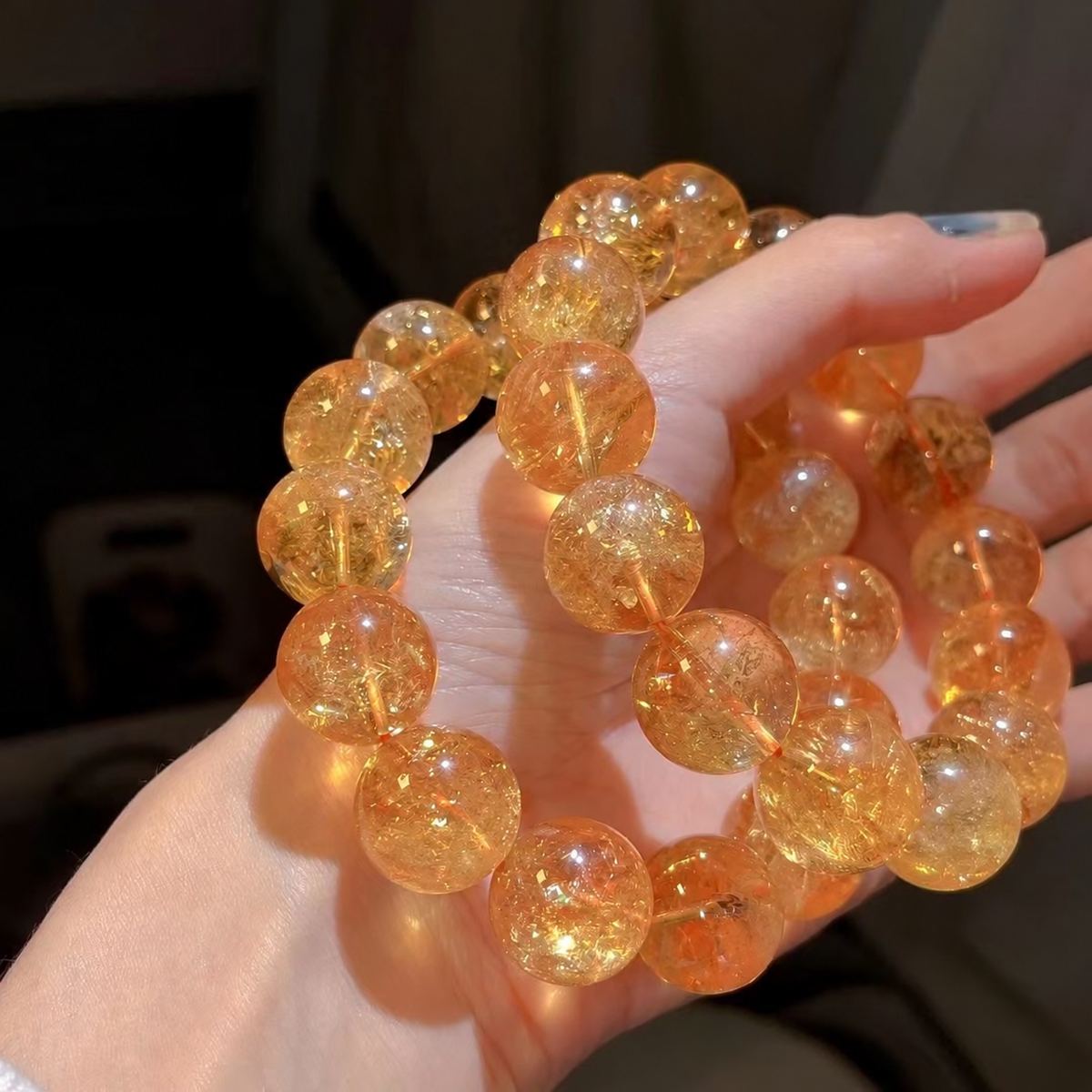 Two golden yellow quartz bracelets showing internal textures