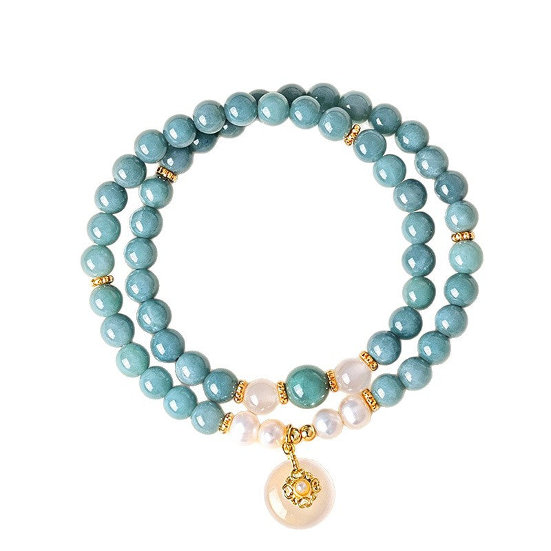Original complete blue-green jadeite bracelet with floral disc charm