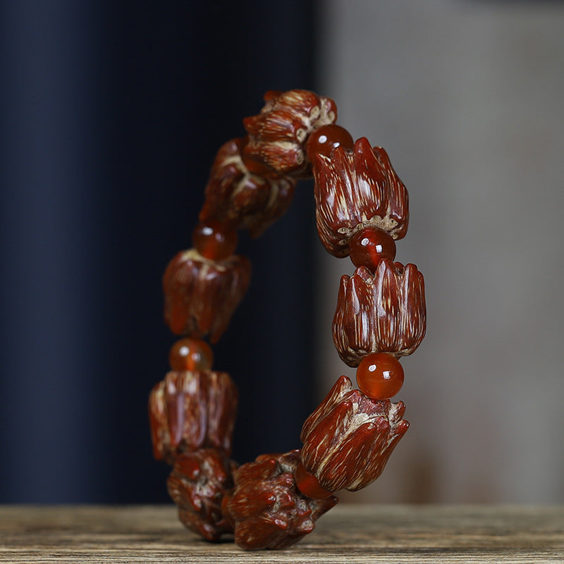Side view of grooved bodhi seed bracelet