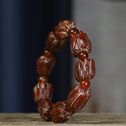 Side view of grooved bodhi seed bracelet