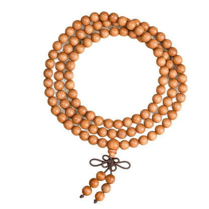 Peach wood 108-bead strand with two beaded tails