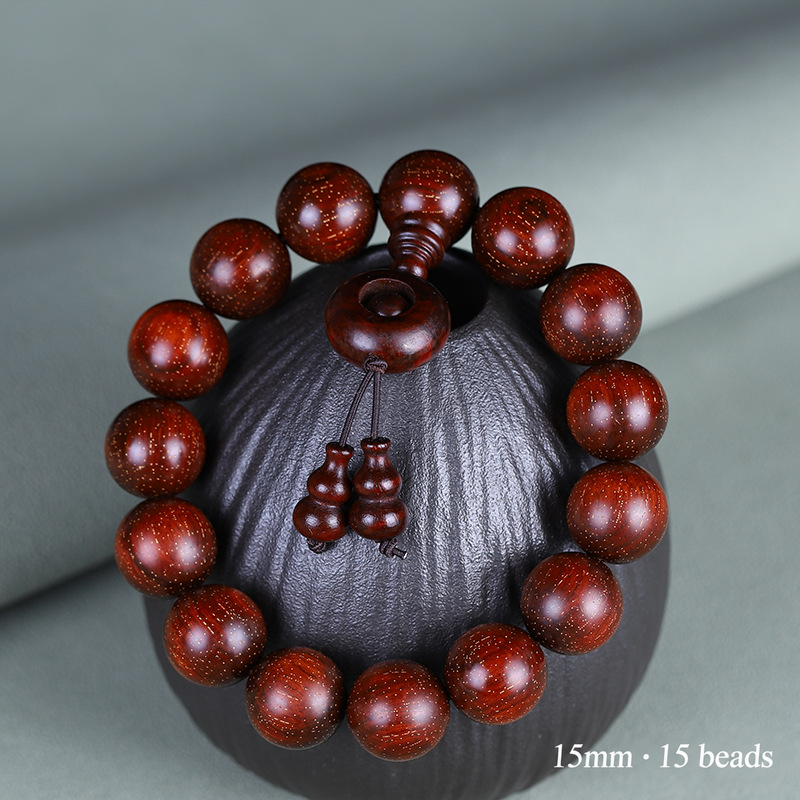 15mm red sandalwood bracelet with 15 beads and wooden ring detail