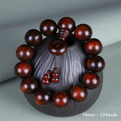 18mm red sandalwood bracelet with 13 beads and wooden ring detail