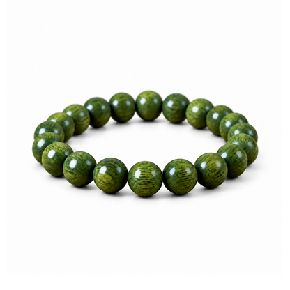Green wood bead bracelet on pure white background