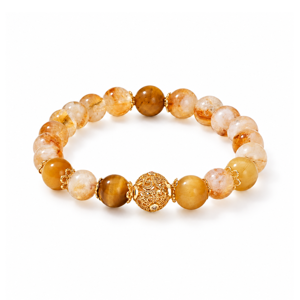 Citrine and tiger eye bracelet with gold-tone filigree center on white background